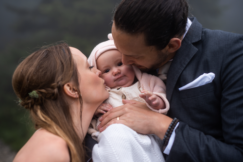 A misty elopement in the mountains with their baby daughter in tow