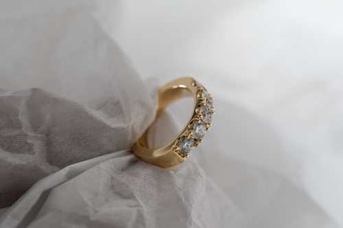 Lab-grown and heirlooms diamonds in recycled gold ecofriendly engagement ring