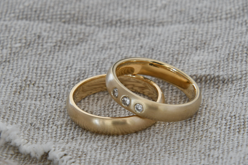 Recycled eco-friendly gold wedding bands with heirloom ethical diamonds