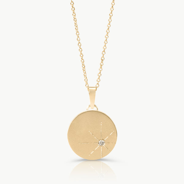 Eco friendly 9 karat gold pendant set with a lab grown diamond