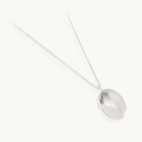 Eco friendly silver oval pendant.