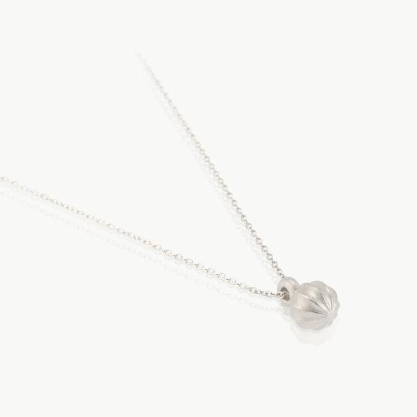 Nature inspired – A pendant with a sustainably mined sterling silver seed charm, artisan crafted in our manufacturing studio in Cape Town.