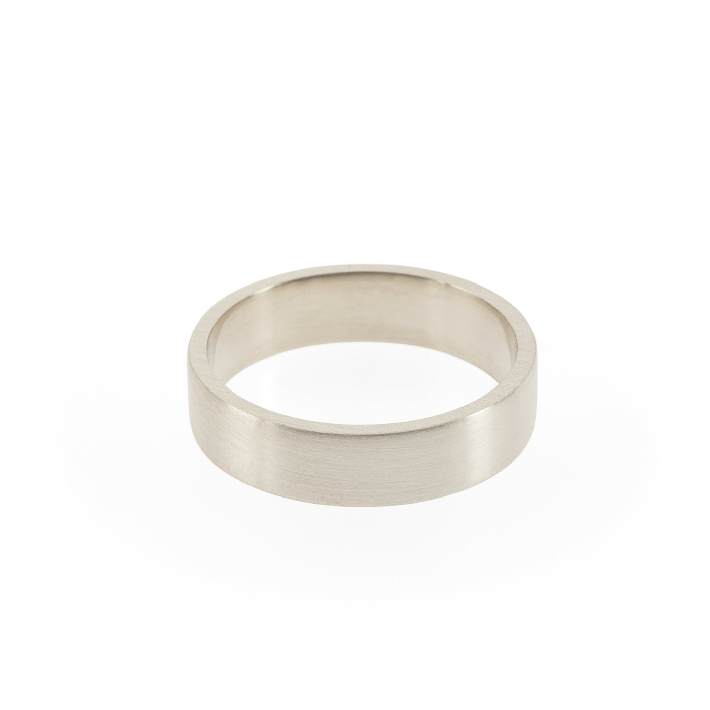 Eco-friendly silver ring. This artisan crafted Flat Band is handmade in Cape Town in recycled silver from e-waste.
