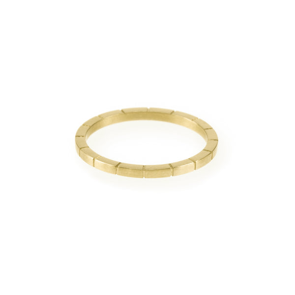 Ethical gold ring ideal for stacking. This minimalist ring with etched lines is handmade in Cape Town in Fairmined certified 9K gold.