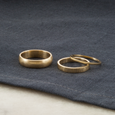 Mix of minimalist eco-friendly recycled gold wedding bands