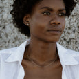 Woman wearing ethical gold necklace. This eco-friendly Simple Chain is made in Cape Town in recycled gold from e-waste.