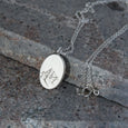 Ethical silver necklace. This eco-friendly Wanderlust Pendant is handmade in Cape Town in recycled silver from e-waste.