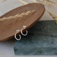 Sustainable silver earrings. These artisan crafted Twist Hoops are handmade in Cape Town in recycled silver from e-waste.