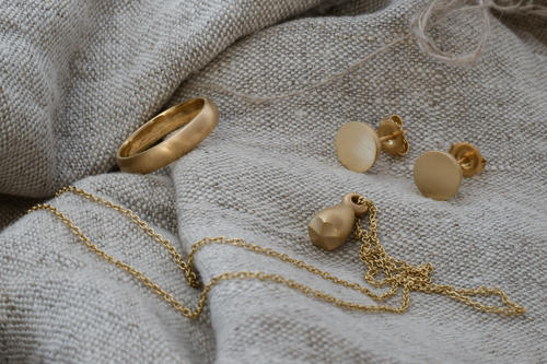 Solid Gold recycled jewellery, future heirlooms. These earrings, pendant and ring are a sustainable alternative to fast fashion jewellery 