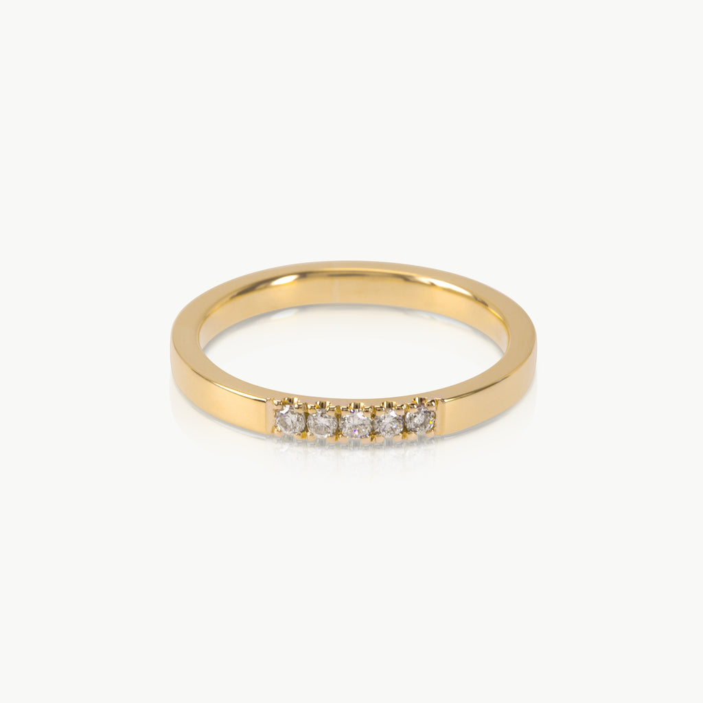 Ethical gold half eternity style ring featuring 5 lab grown diamonds