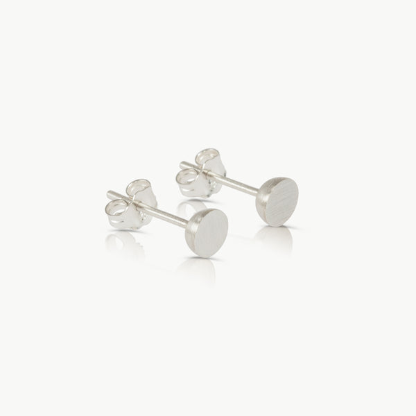 Pair of silver stud earrings handmade in eco-friendly silver