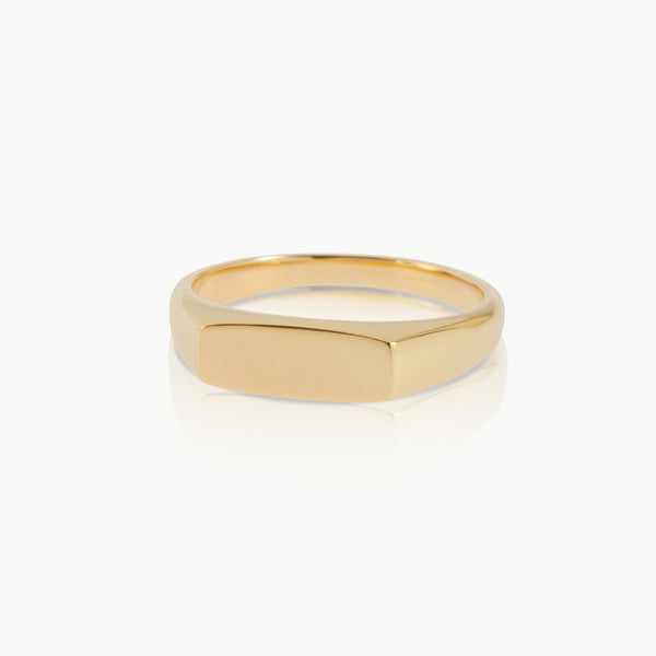 Handcrafted rectangular gold signet ring in sustainable ethical gold.