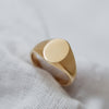 Fairmined eco-friendly gold signet ring with timeless oval face design.