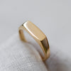 Ethical signet ring in eco-friendly 9K gold, contemporary handcrafted jewellery.