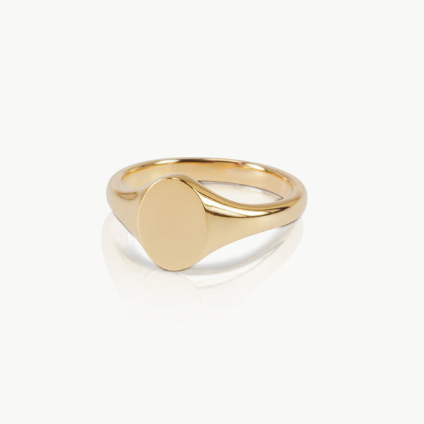 Handmade ethical gold oval signet ring crafted in sustainable Fairmined gold
