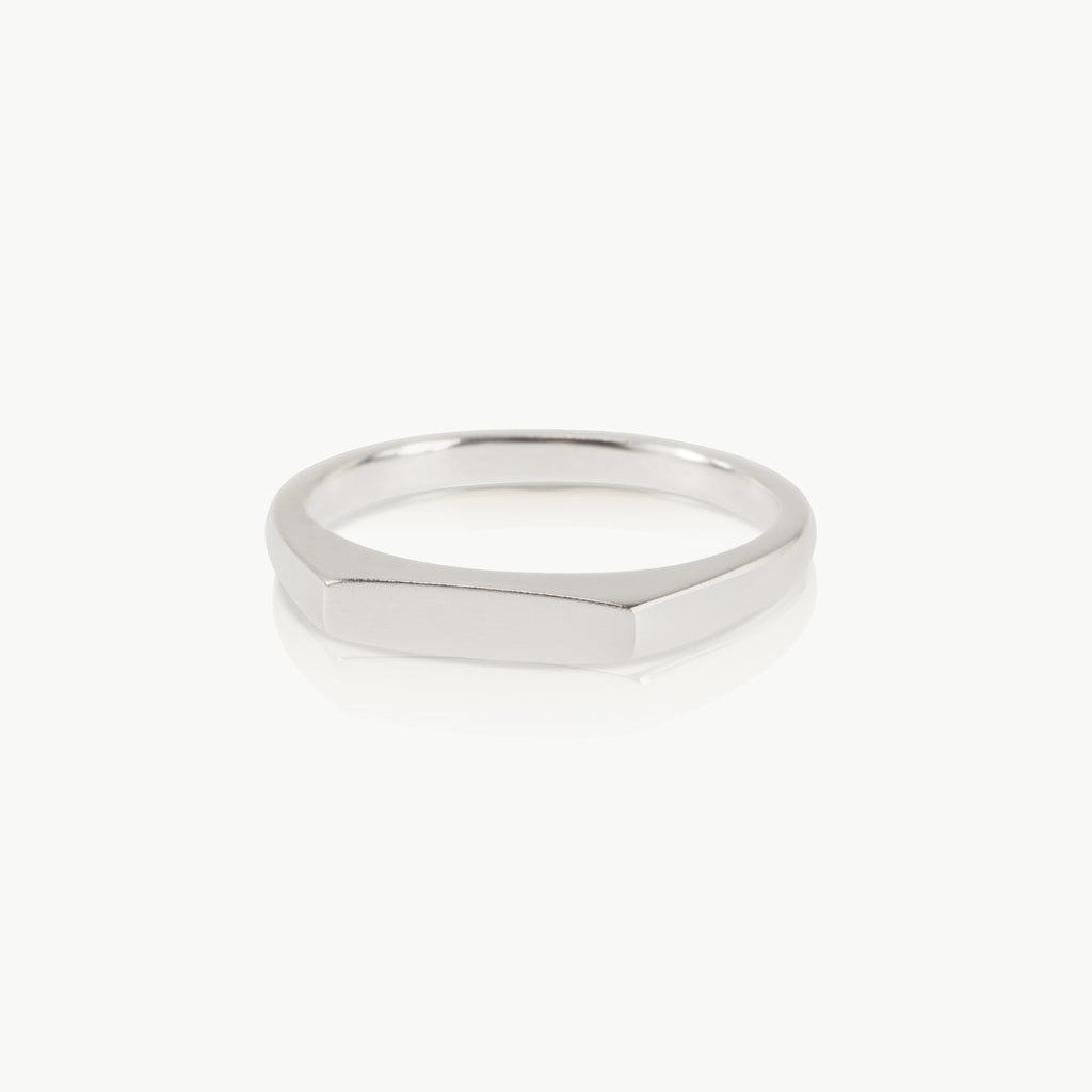 Timelessly elegant signet ring – The dainty rectangular face can be left plain or engraved. This ethical sterling silver ring is expertly crafted in Cape Town.