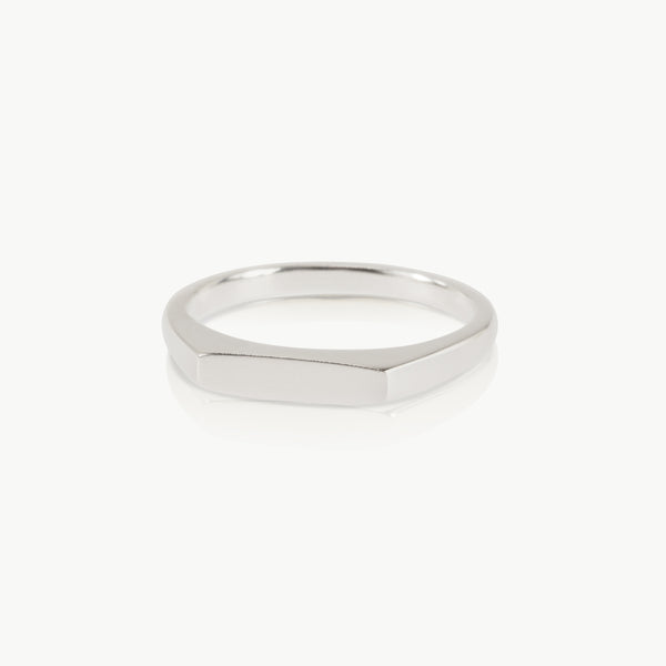 Timelessly elegant signet ring – The dainty rectangular face can be left plain or engraved. This ethical sterling silver ring is expertly crafted in Cape Town.