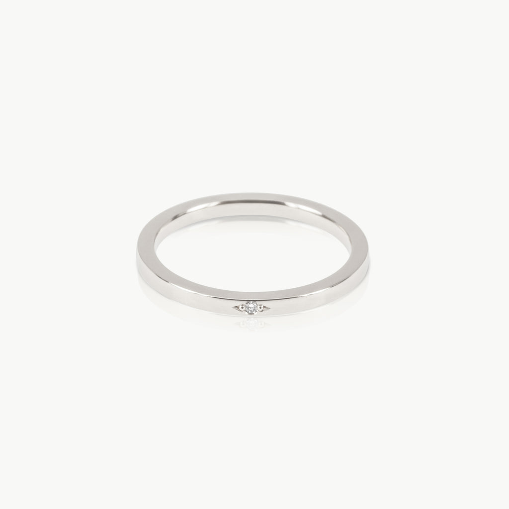 Ethically mined sterling silver ring with a tiny lab grown diamond
