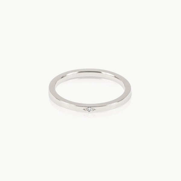 Ethically mined sterling silver ring with a tiny lab grown diamond
