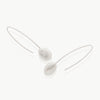 A customer design favourite of 15 years – A silver wired drop earring culminating in an ethically mined sterling silver dome. Hand crafted in Cape Town.