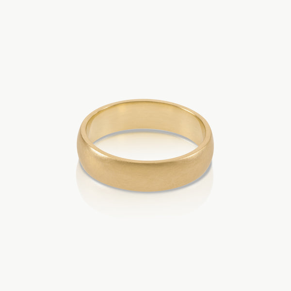 Ethical gold wedding ring. This minimalist Domed Band is handmade in Cape Town from 9 karat Fairmined gold