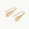 Imagine an extended water droplet about to fall from a leaf, this elongated drop earring design is nature inspired and hand crafted in Cape Town, South Africa in 9K gold.