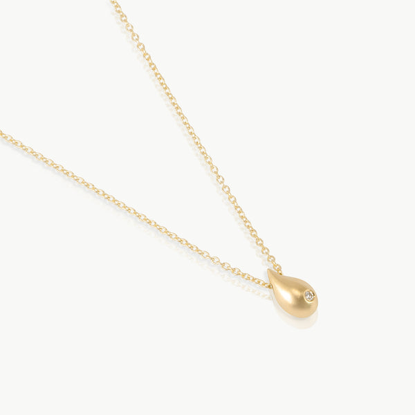 Water inspired pendant – A lab-grown diamond sparkle in a water droplet charm fashioned by artisan hands in Cape Town from sterling silver. 