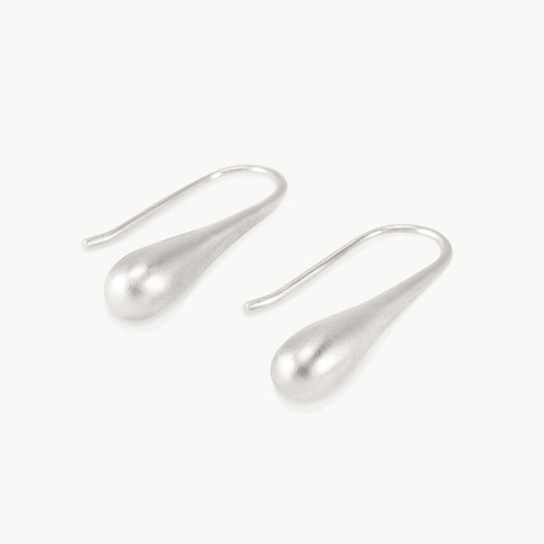 Imagine an extended water droplet about to fall from a leaf, this elongated drop earring design is nature inspired and hand crafted in Cape Town, South Africa.