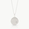 Handcrafted by an independent jeweller in Cape Town – A large disc pendant in sterling silver and set with a lab-grown diamond, inspired by the night sky. 