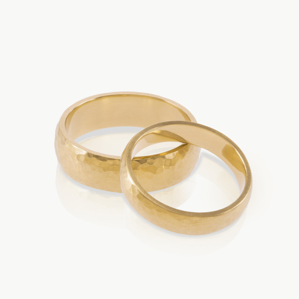 Rustic hammered gold wedding ring available in rose, yellow or white ethical gold.