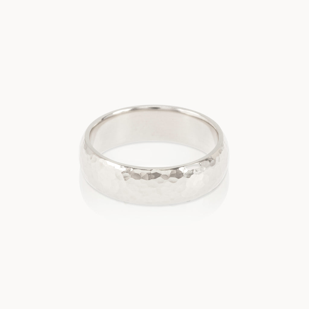 Wide hammered Fairmined silver band, unisex minimalist jewellery handcrafted sustainably.