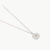 Solar system inspired – The small disc charm on a chain is handmade in Cape Town from ethically mined sterling silver and set with a lab-grown diamond.