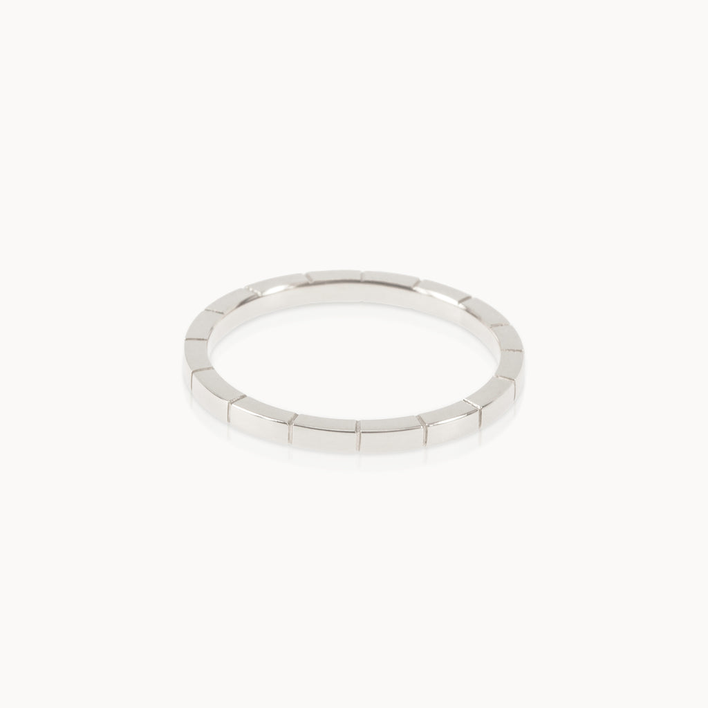 Eco-friendly silver ring featuring fine engraved lines, minimalist ethical jewellery handmade in Cape Town.