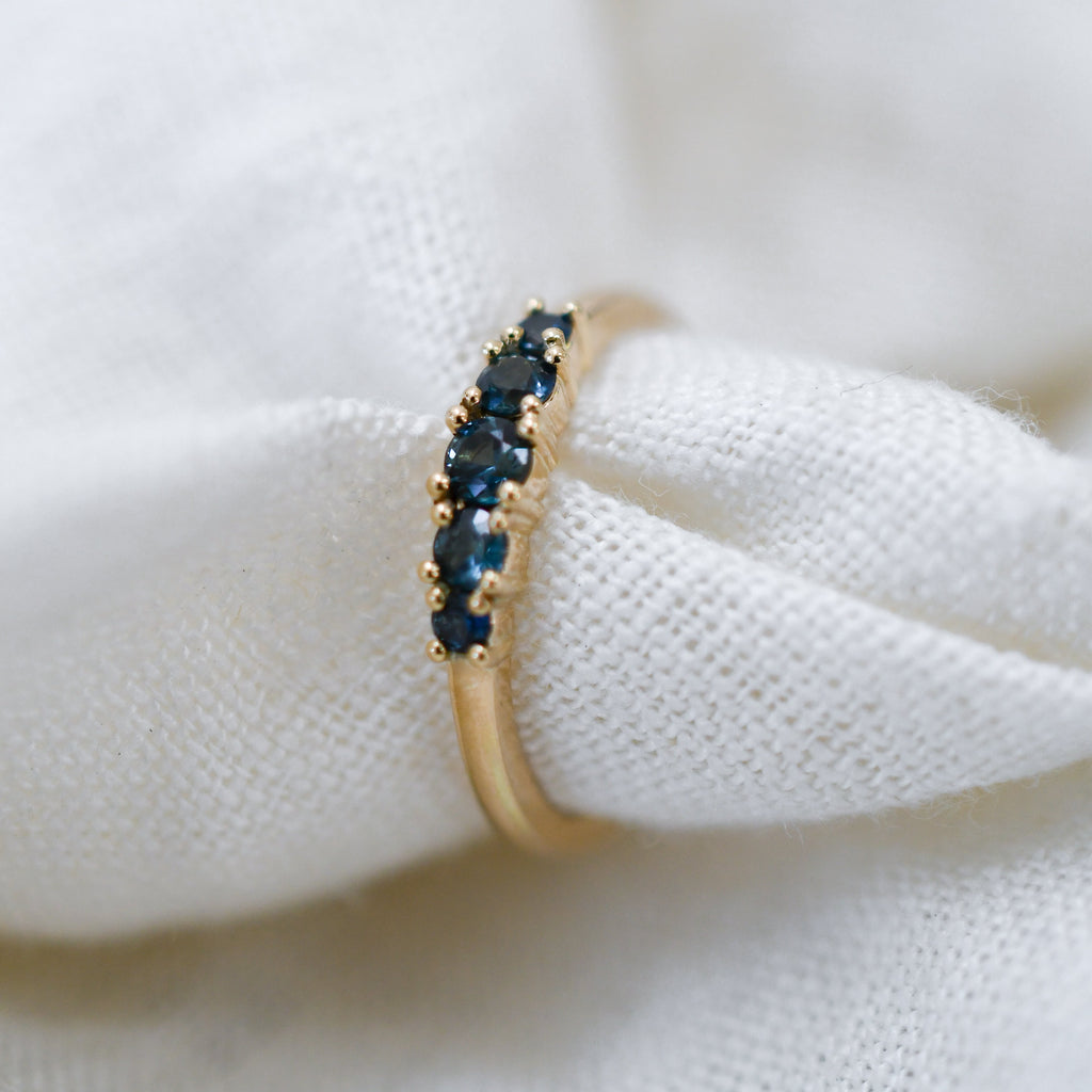 Ethically sourced blue sapphires set in a 9ct yellow gold ring