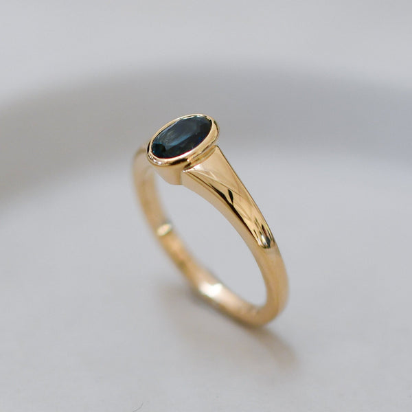 9ct gold ring with a deep blue sapphire sourced from Queensland, Australia