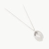 A timeless piece - An oval sterling silver pebble pendant inspired by the earth, created in our established independent studio in the Old Biscuit Mill, Cape Town. 