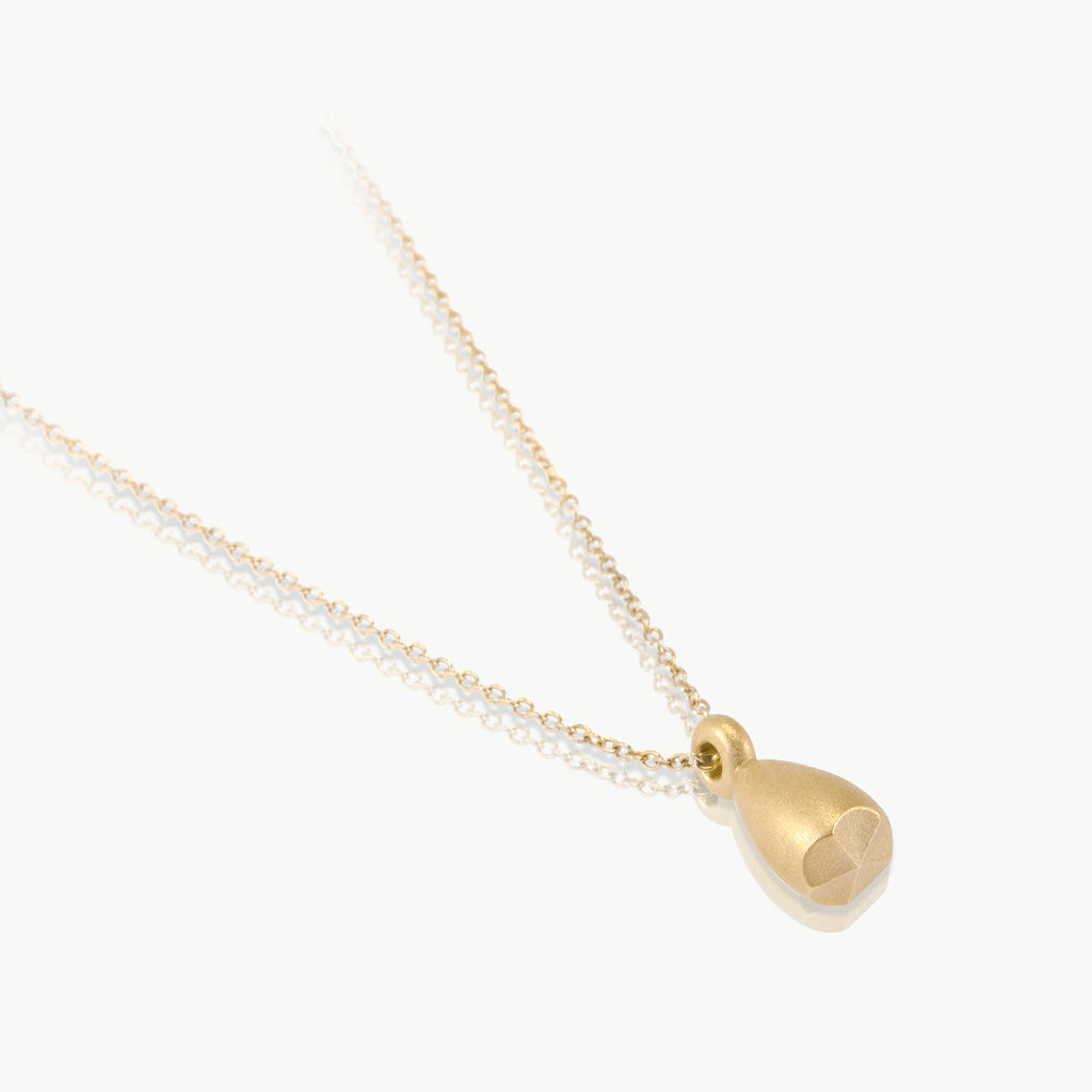 Sustainable 9 karat gold necklace. This ethical pendant is handmade in Cape Town 