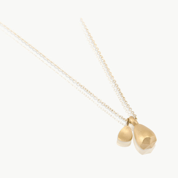 Eco-friendly gold necklace. This artisan crafted Pod Pendant with Leaf is handmade in Cape Town in Fairmined  9 karat gold