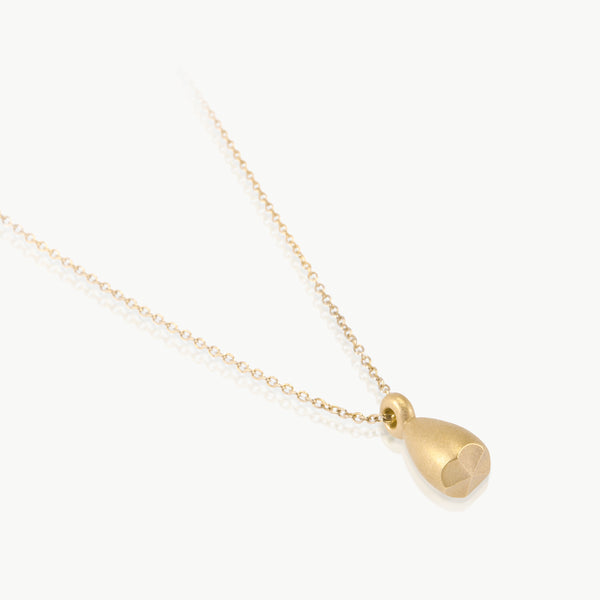 Botanical inspired - A pendant with a sustainably mined 9K gold seed pod charm, artisan crafted in our manufacturing studio in Cape Town. 