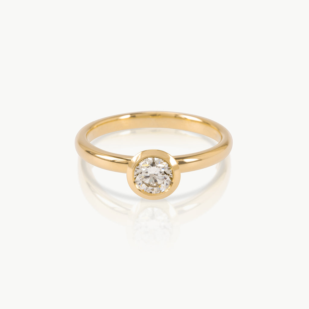 0.5 carat lab grown diamond engagement ring handcrafted in eco-friendly, ethical gold
