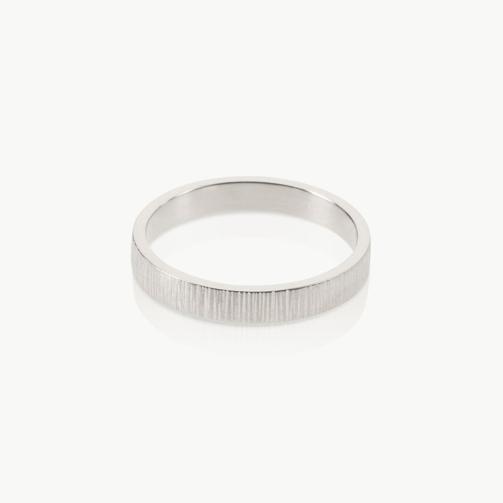 Ethical jewellery – A nature inspired unisex ring with a bark texture. Handmade in Cape Town in sustainable sterling silver and available in different widths.