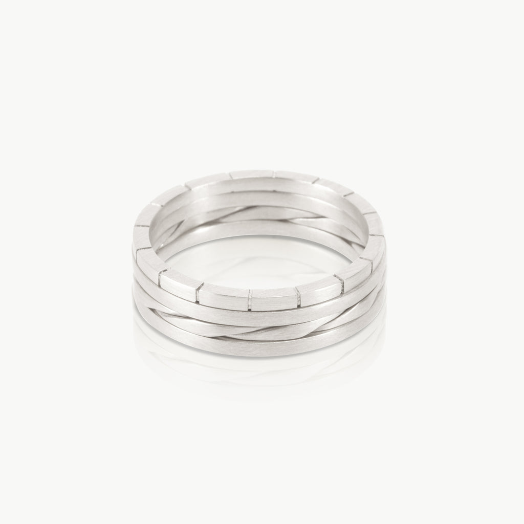 Four fitted sterling silver rings handcrafted from ethical metal