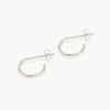 Two sterling silver strands twisted together to form a small hoop earring. Handmade in our well-established fine jewellery design studio in Cape Town.