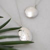 Limited edition pendant handcrafted in ethically sourced, Fairmined sterling silver with a hand-engraved wreath of leaves on a 50cm chain