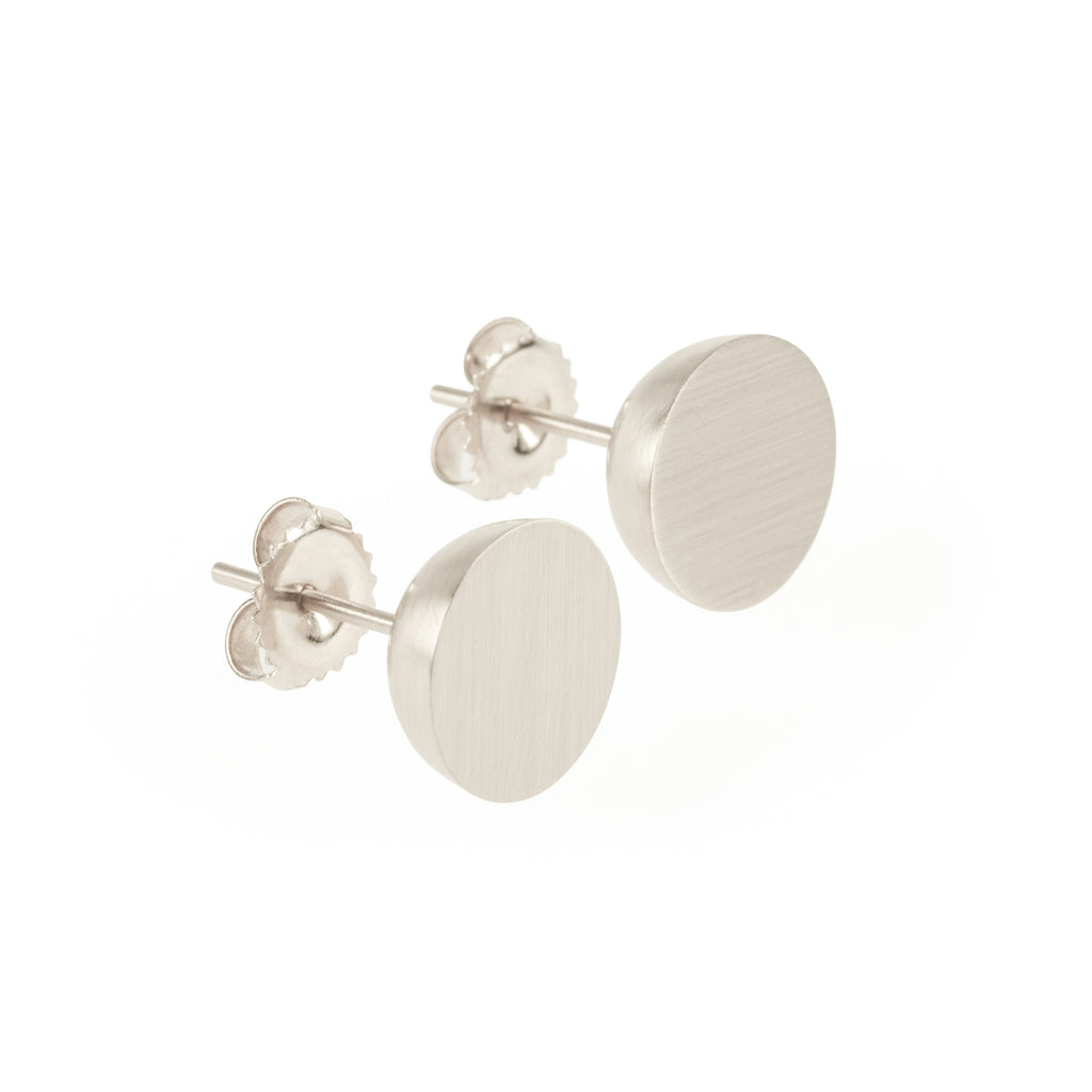 Ethical silver earrings. These minimalist 11mm Hemisphere Studs are handmade in Cape Town in recycled silver from e-waste.