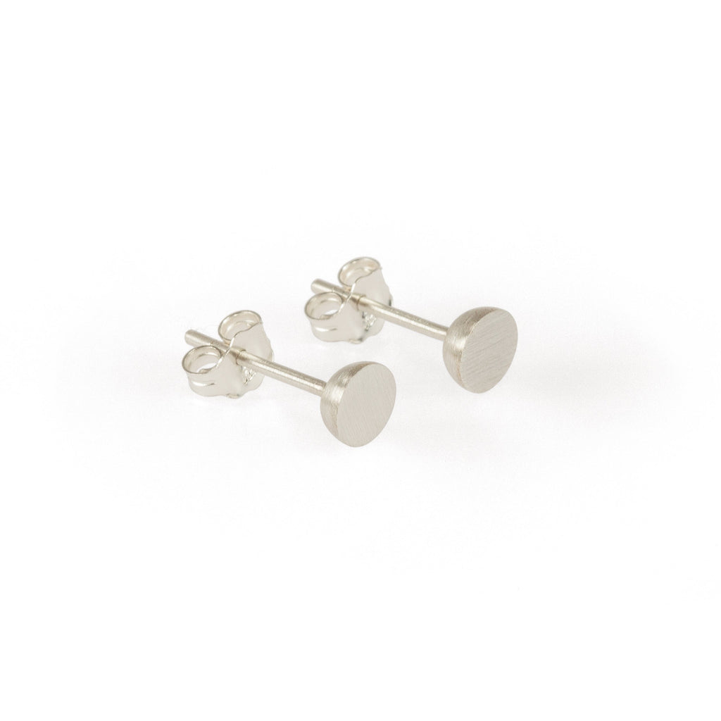 Ethical silver earrings. These minimalist 5mm Hemisphere Studs are handmade in Cape Town in recycled silver from e-waste.