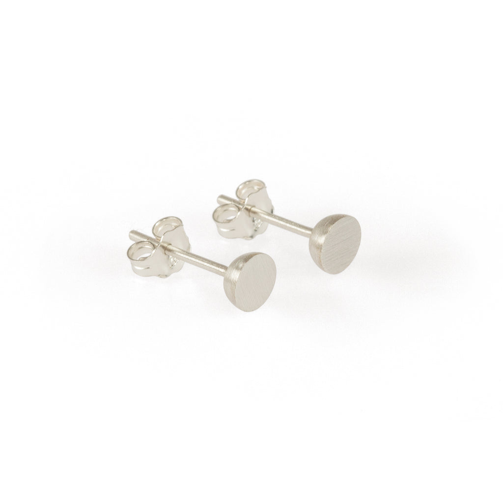 Ethical silver earrings. These minimalist 5mm Hemisphere Studs are handmade in Cape Town in recycled silver from e-waste.