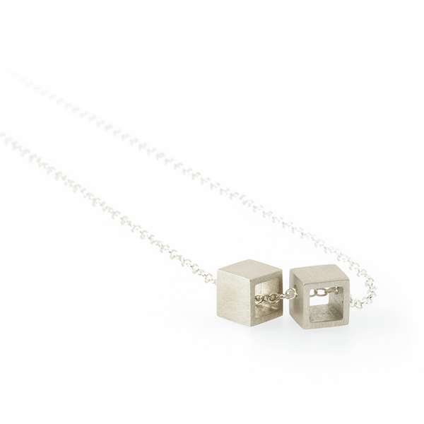 Sustainable silver pendant. This ethical Double Cube Pendant is handmade in Cape Town in recycled silver from e-waste.