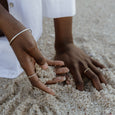 Woman wearing an ethical silver ring. This minimalist Line Ring is handmade in Cape Town in recycled silver from e-waste.