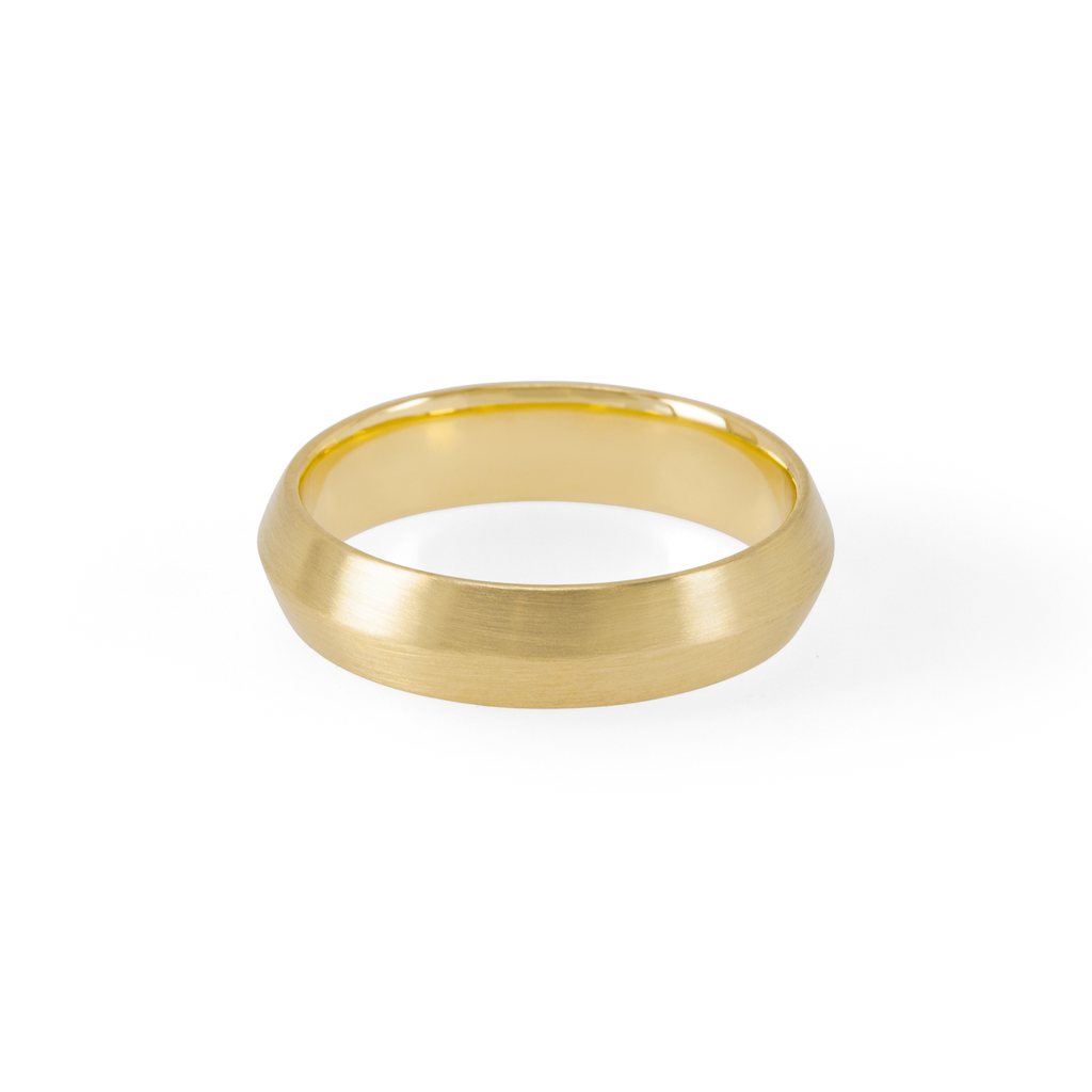 Knife Edge eco-conscious recycled gold wedding band